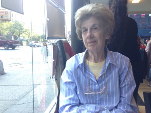 Nana watching the world go by from out window seat at yesterday's breakfast diner.